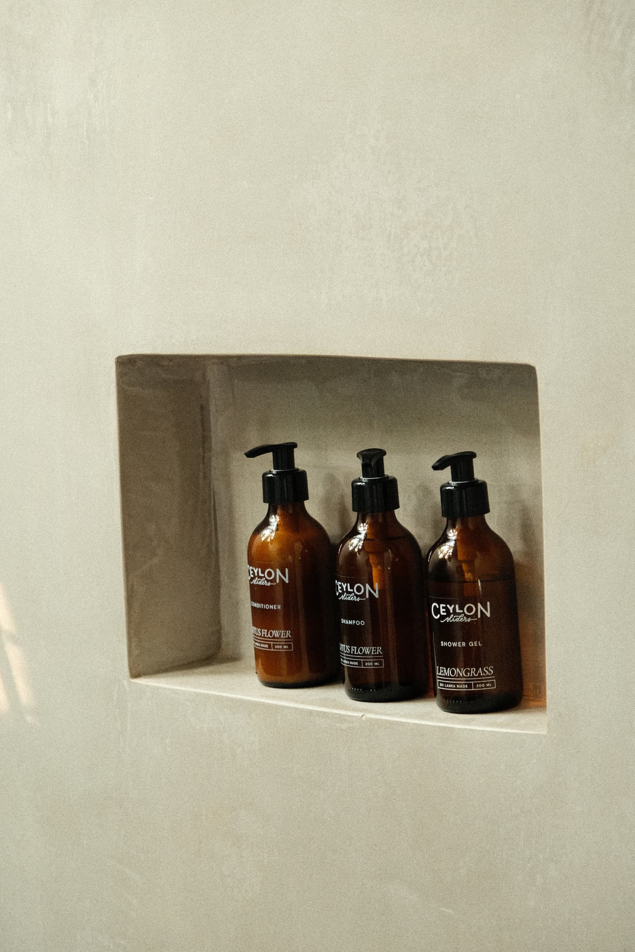 Locally made Ceylon toiletries in a bathroom niche