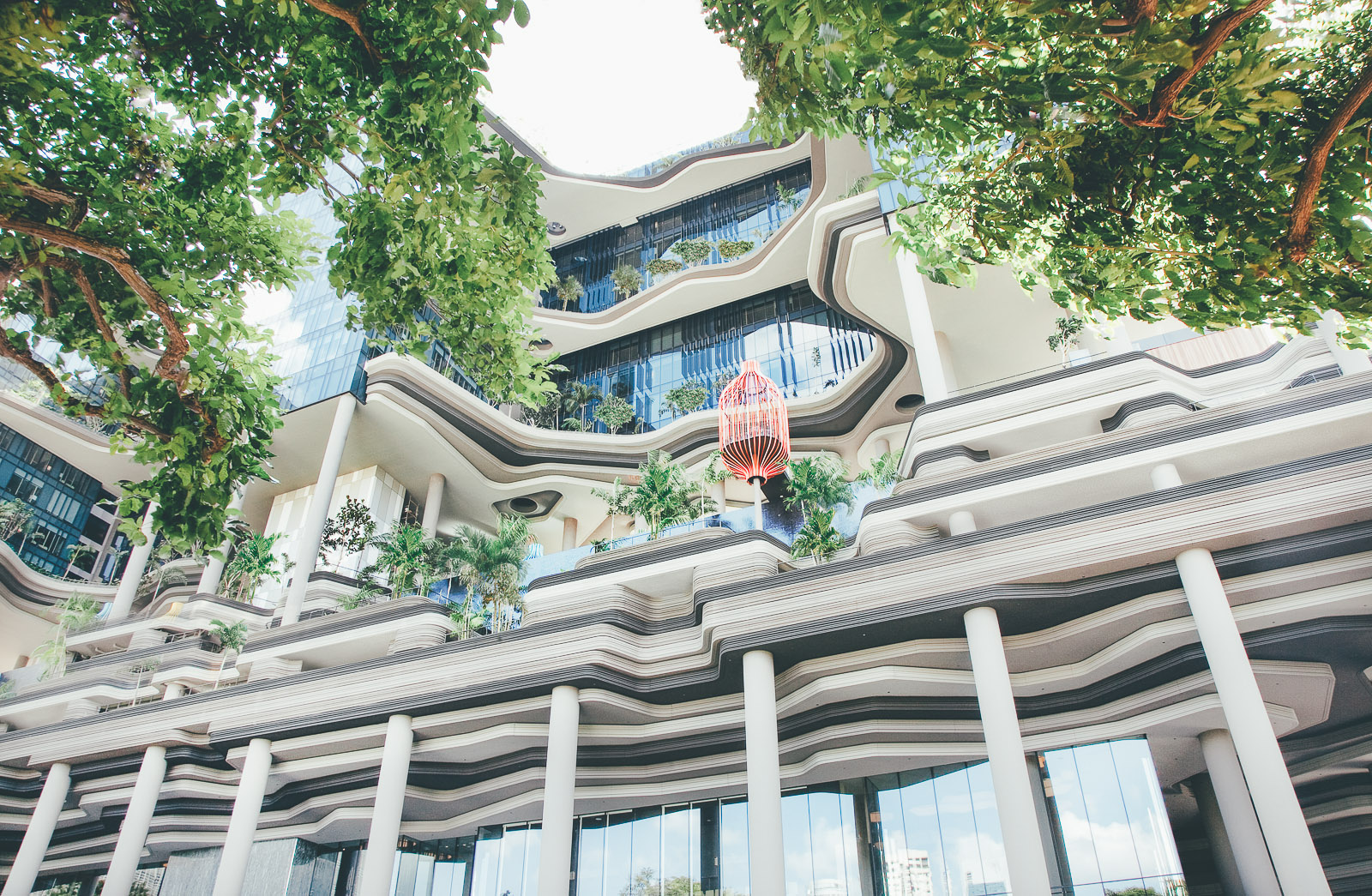 Sunshinestories-surf-travel-blog-02.  PARKROYAL on Pickering Exterior_Hanging Red Cabana (vertical)_Photo Credit; Patrick Bingham Hall