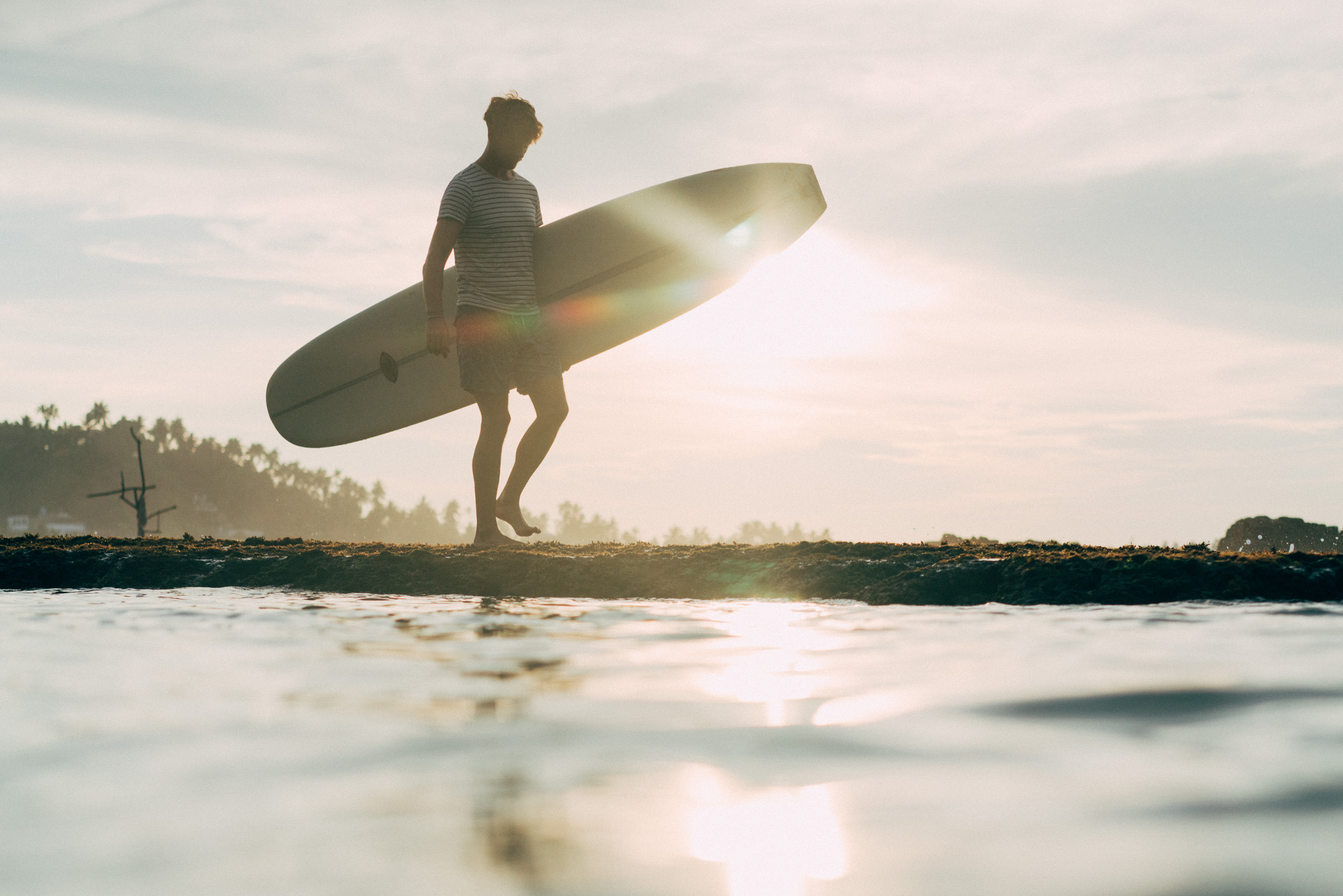 Surfing 101: How to Paddle In Like a Pro and Catch Waves with Ease - Surfer